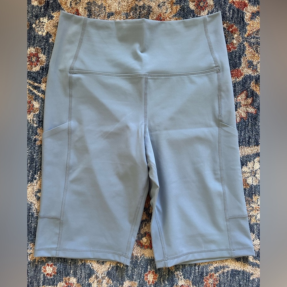 NWOT Glyder biker shorts 10” inseam size large light blue with pockets